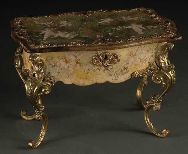 LOUIS XV STYLE GILT BRONZE AND VERNIS MARTIN DECOR: A LOUIS XV STYLE GILT BRONZE AND VERNIS MARTIN DECORATED CASKET with hinged lid, late 19th century, decorated with various putti and florals raised on gilt bronze scrolling legs. Height 7 inches, widt