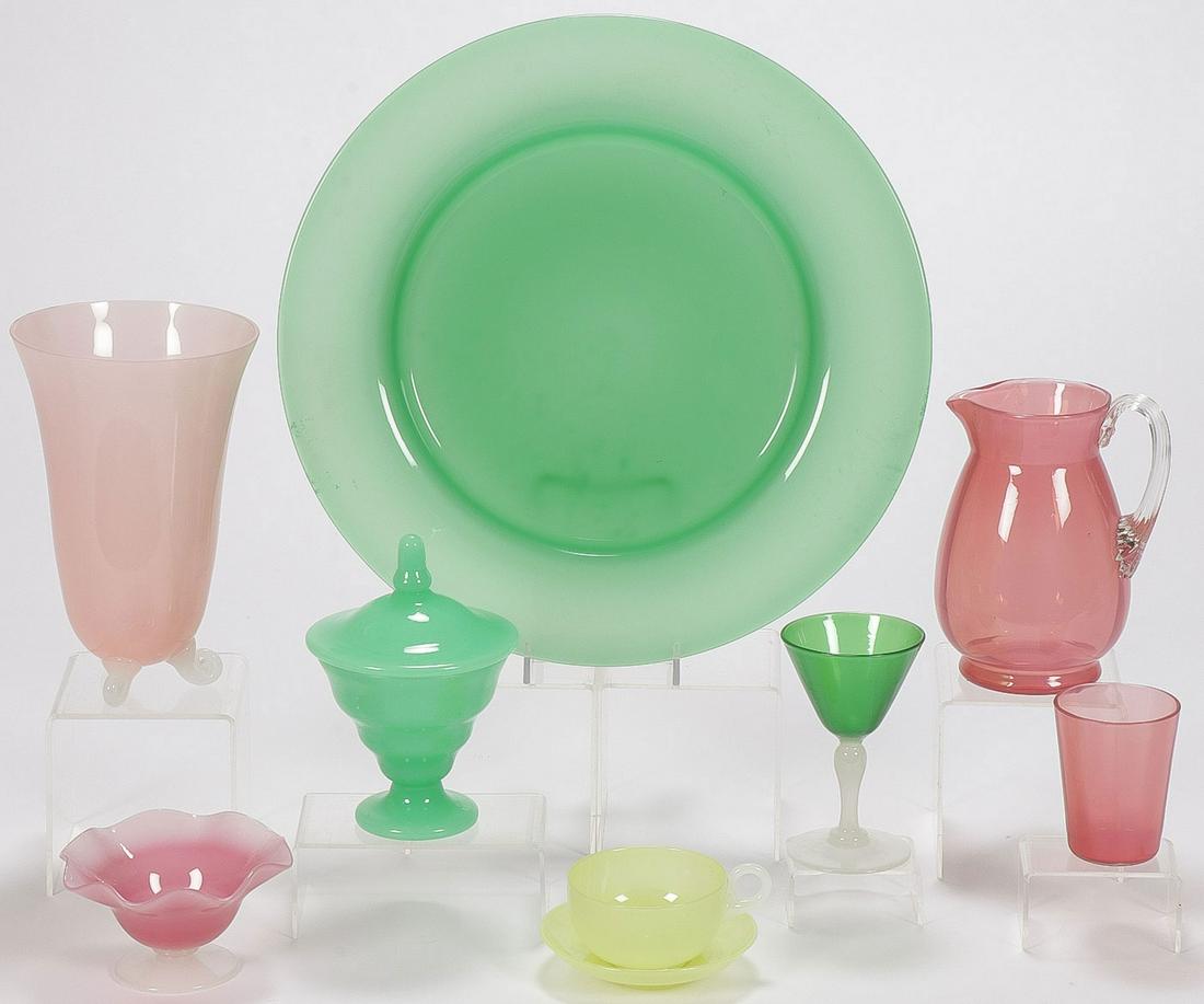 VINTAGE ALABASTER ART GLASS GROUP: VINTAGE ALABASTER ART GLASS GROUP. Comprising 7 pieces of vintage alabaster art glass, most likely Steuben, including a jade green charger, diameter 14 inches, a Rosaline footed bell-shaped paneled va