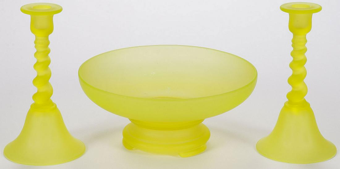 VASELINE SATIN GLASS CONSOLE SET: VASELINE SATIN GLASS CONSOLE SET. Comprising a large Vaseline console bowl on separate raised footed base, diameter 11.5 inches (height 5 inches), together with two matching candlestands with twist st