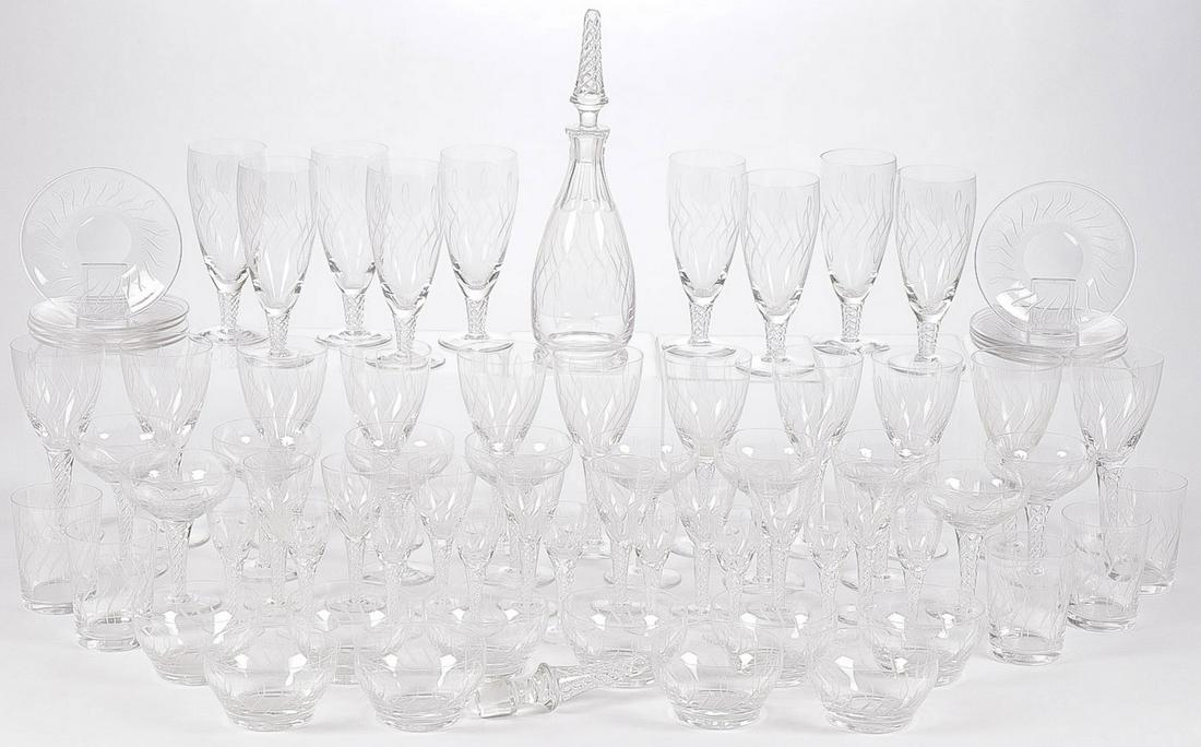 80 PIECES STUART "RHYTHM" CRYSTAL STEMWARE: 80 PIECES STUART "RHYTHM" CRYSTAL STEMWARE. Comprising 80 individual pieces including 9 iced tea glasses (7.75 inches), 11 water goblets (7.5 inches), 8 wine glasses (5.5 inches), 10 champagnes (5.25 
