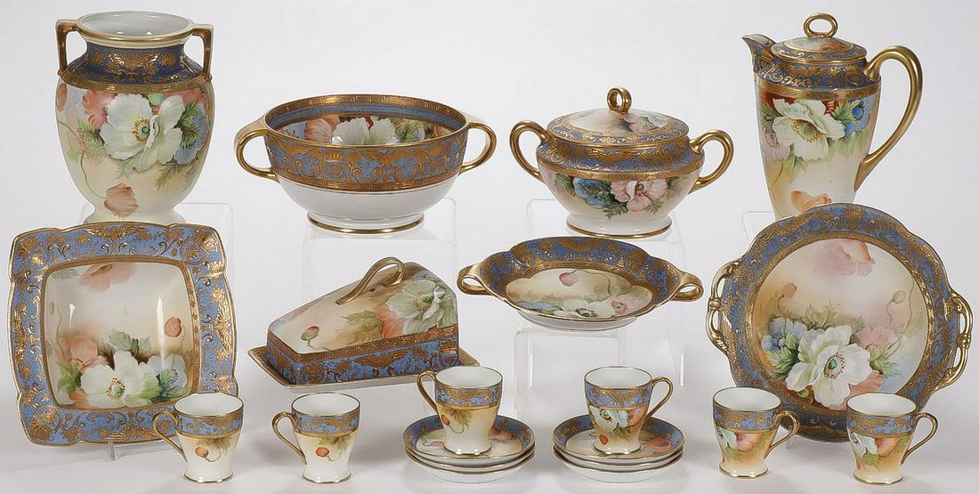 RARE 20-PIECE NIPPON SERVICE: RARE 20-PIECE NIPPON SERVICE. Comprising 20 individual pieces decorated in the same poppy motif with Wedgwood blue and gilt banding, including six cups and saucers, a teapot, a covered cheese, a soup 