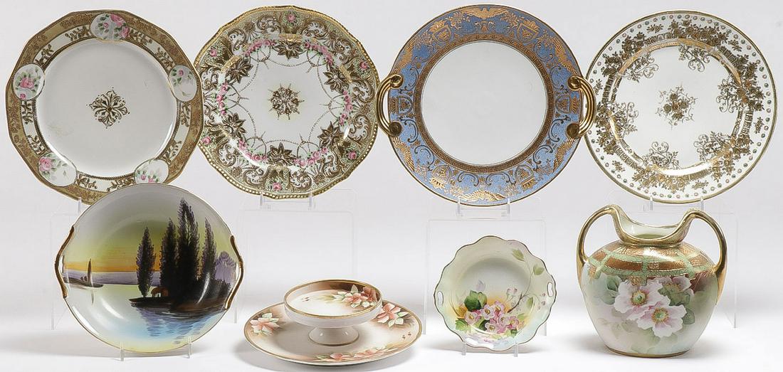 8 PIECES OF NIPPON PORCELAIN: 8 PIECES OF NIPPON PORCELAIN. Including four plates with ornate gilt decoration, a double handled vase, two bowls, and a double tiered dish. Greatest measurement 11.25 inches. SHIPPING NOTICE: Jackso