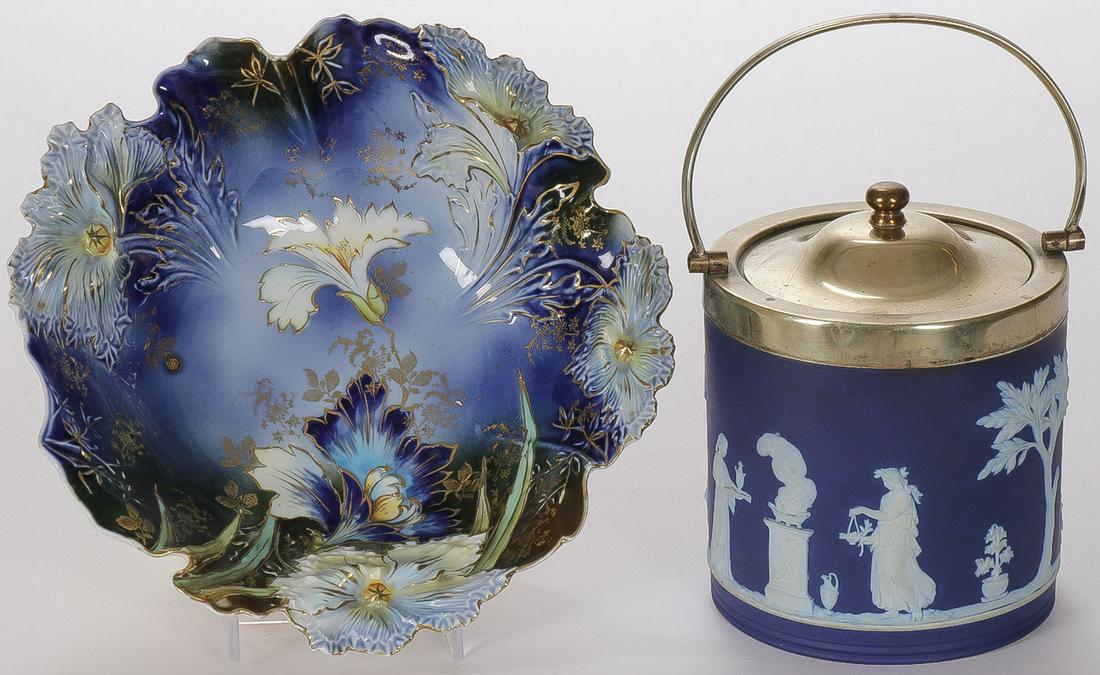 RS PRUSSIA & WEDGWOOD: RS PRUSSIA & WEDGWOOD. Comprising an RS Prussia Iris molded bowl, diameter 9.75 inches, and a Wedgwood biscuit jar, overall height 9 inches. SHIPPING NOTICE: Jackson's is your sole and only sourc