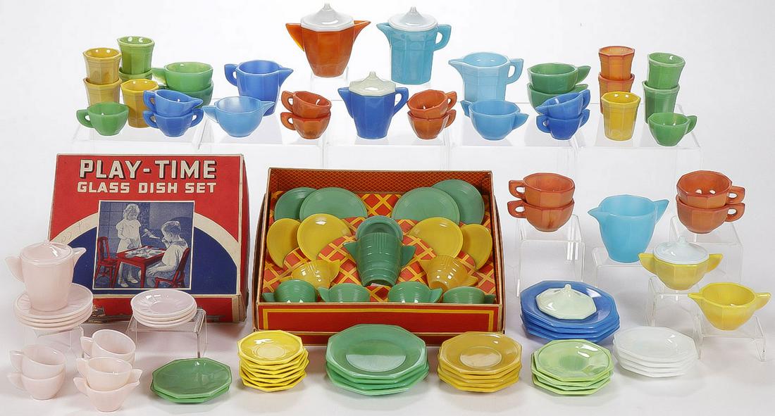 LARGE GROUP AKRO AGATE CHILDREN'S DISHES: LARGE GROUP AKRO AGATE CHILDREN'S DISHES. Comprising over 80 individual pieces of Akro Agate children's tea ware sets, in various colors and patterns as shown, including a 15-piece assembled set in gr
