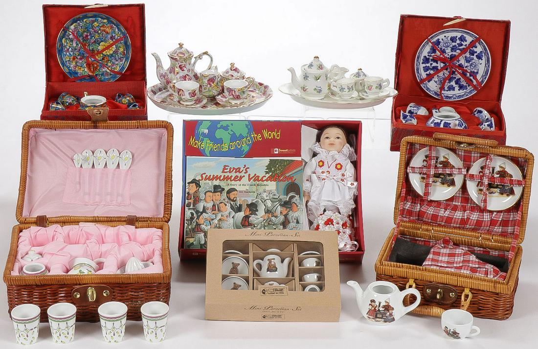 7 CHILDREN'S TEA SETS: 7 CHILDREN'S TEA SETS. Comprising seven contemporary porcelain children's tea services including two Chinese examples in original box, two examples in woven wicker basket box, and others as shown. SHI
