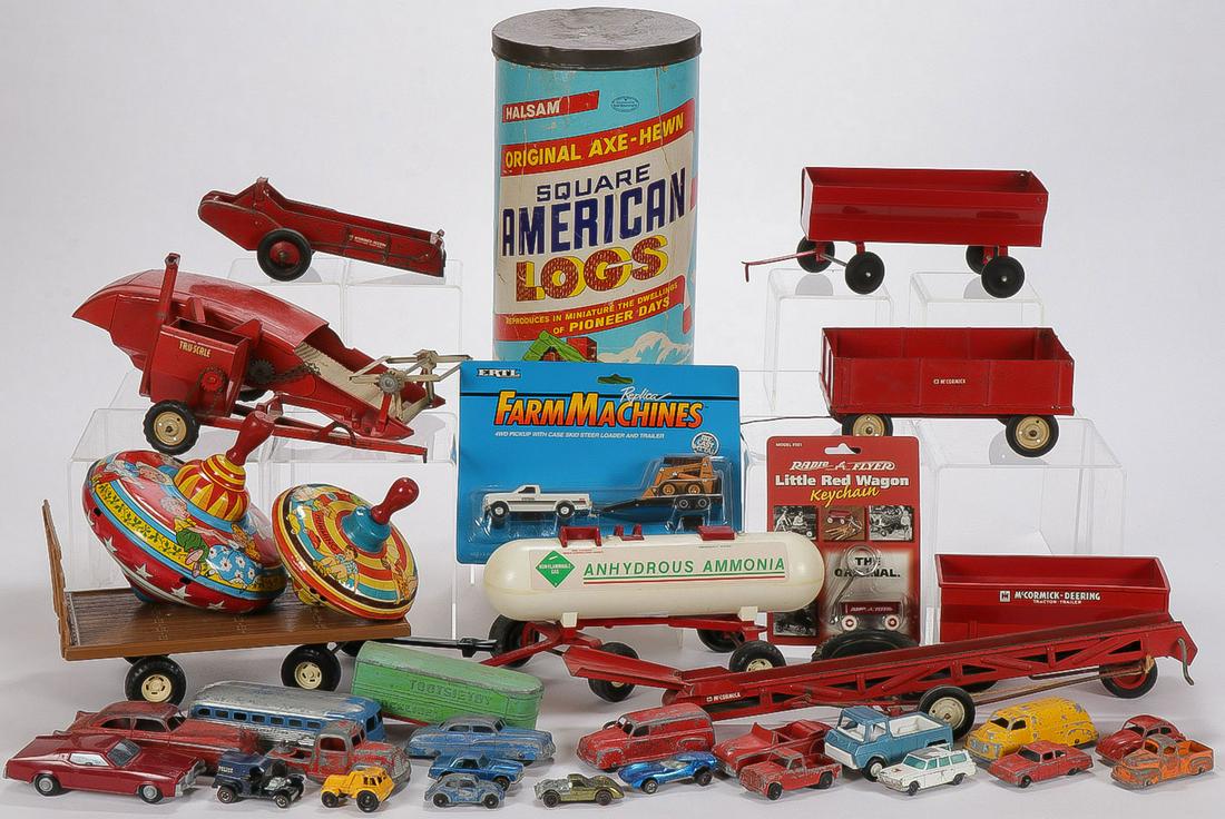 MIXED LOT VINTAGE TOYS: MIXED LOT VINTAGE TOYS. Comprising over 35 individual pieces including tootsie cars, hot wheels, Ertl toys, true scale farm equipment, tin lithograph tops by Ohio Art, and a box of Lincoln logs. SHIPP