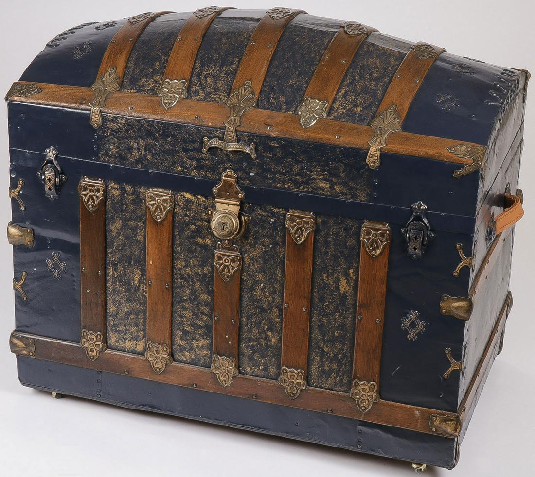 NICE VINTAGE CAMEL BACK TRUNK: NICE VINTAGE CAMEL BACK TRUNK. With intact wood banding and some restorations, height 31.5 inches, width 37 inches, depth 22.5 inches. SHIPPING NOTICE:Jackson's is your sole and only source for