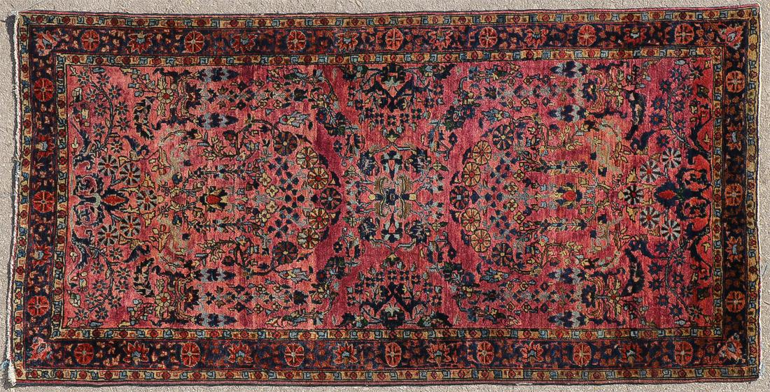 A PAIR OF ORIENTAL RUGS: A PAIR OF ORIENTAL RUGS. Comprising a Sarouk 59 inches x 31 inches and a Heriz or Hamadan runner 113 inches x 33 inches. SHIPPING NOTICE: Jackson's is your sole and only source for one stop packing an