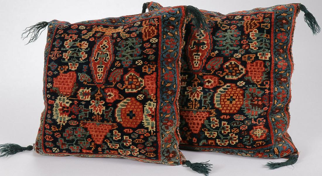PAIR OF ORIENTAL BAG FACE PILLOWS, C 1920: PAIR OF ORIENTAL BAG FACE PILLOWS, C 1920. Nice colors, good pile, and good condition. Each approximately 21 inches x 21 inches. SHIPPING NOTICE: Jackson's is your sole and only source for one sto
