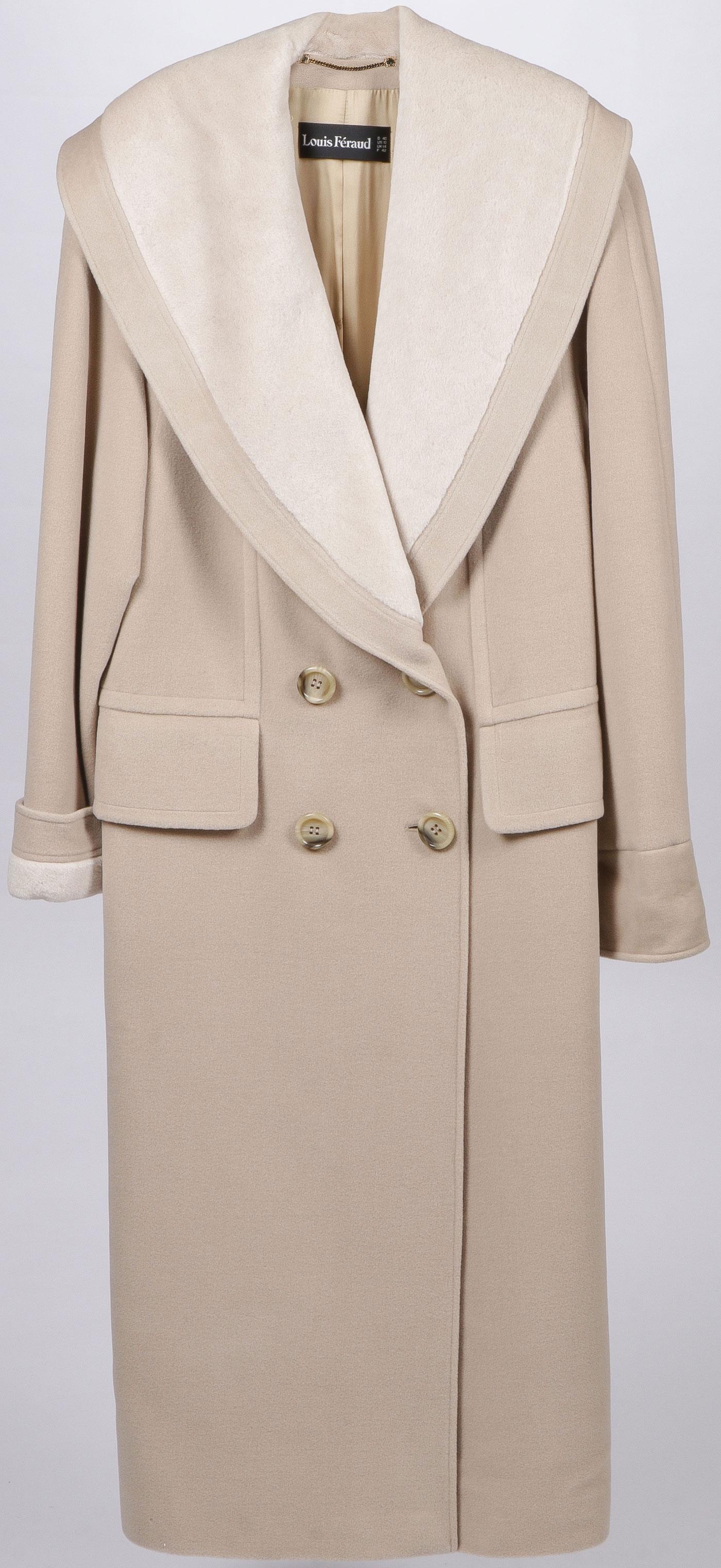 A LOUIS FERAUD CASHMERE COAT: A LOUIS FERAUD CASHMERE COAT. US size 10 in very good condition.SHIPPING NOTICE:Jackson's is your sole and only source for one stop packing and shipping. With over 50 years of experience, our pr