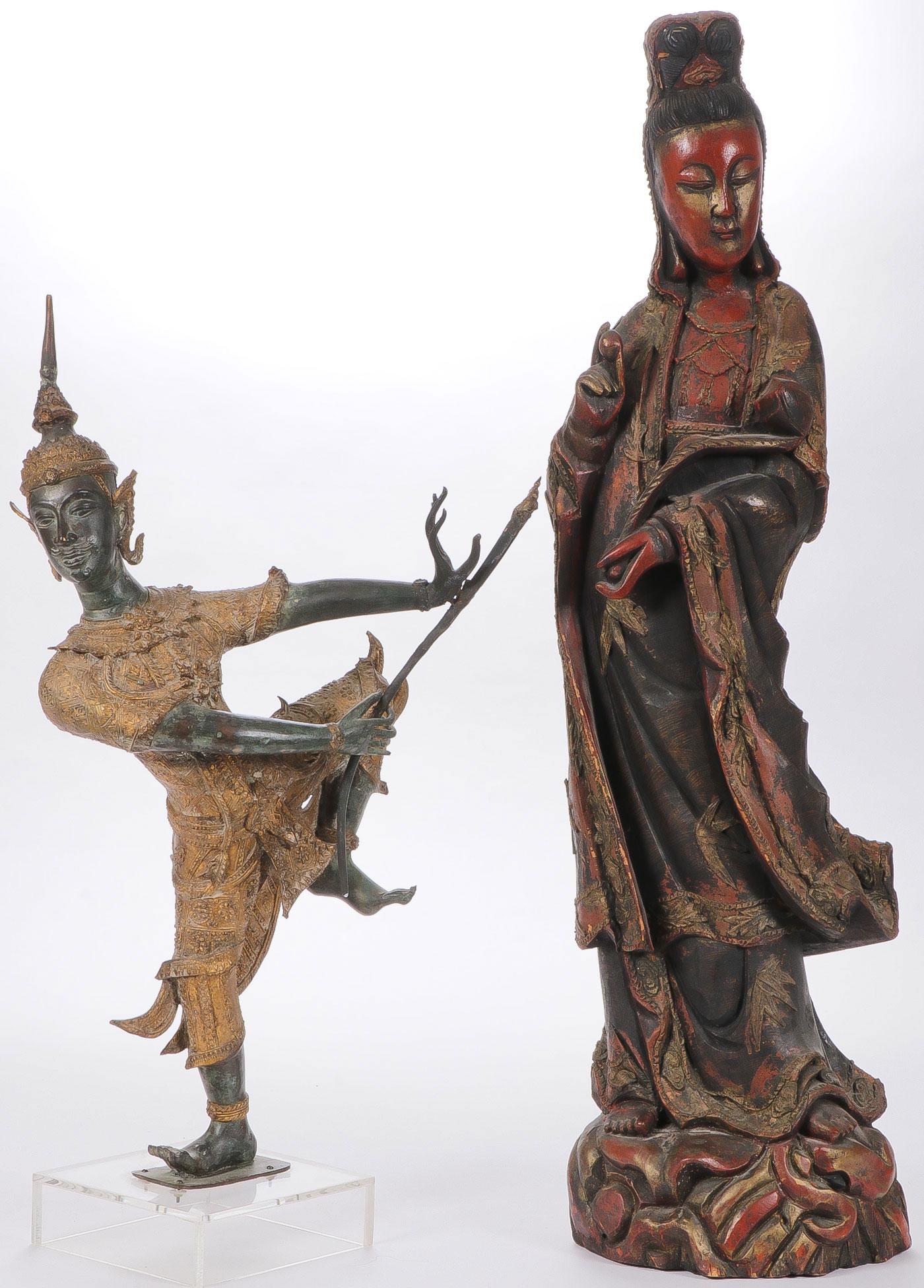 ASIAN SCULPTURE GROUP: ASIAN SCULPTURE GROUP. Comprising a bronze patinated Thai dancer on acrylic stand, overall height 27.5 inches. Together with a carved polychrome and gilt wood figure of Guanyin, height 35.75 inches (9