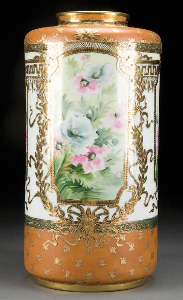 NIPPON JEWELED PORCELAIN FLOOR VASE: A LARGE HAND PAINTED NIPPON JEWELED PORCELAIN FLOOR VASE early 20th century, with wild flower decoration within a scrolled gilt and jeweled framework. Blue maple leaf mark. Height 15 inches. Estimate 