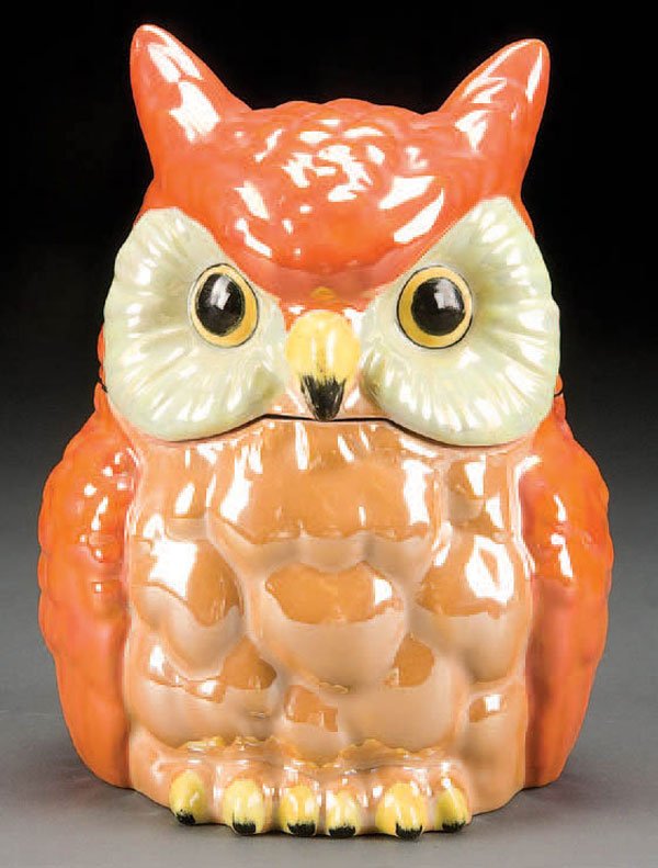A HAND PAINTED NORITAKE OWL FORM LIDDED HUMIDOR e: A HAND PAINTED NORITAKE OWL FORM LIDDED HUMIDOR early 20th century, with orange and marigold lustre decoration. Unmarked. Height 7 inches. Estimate $300-$500