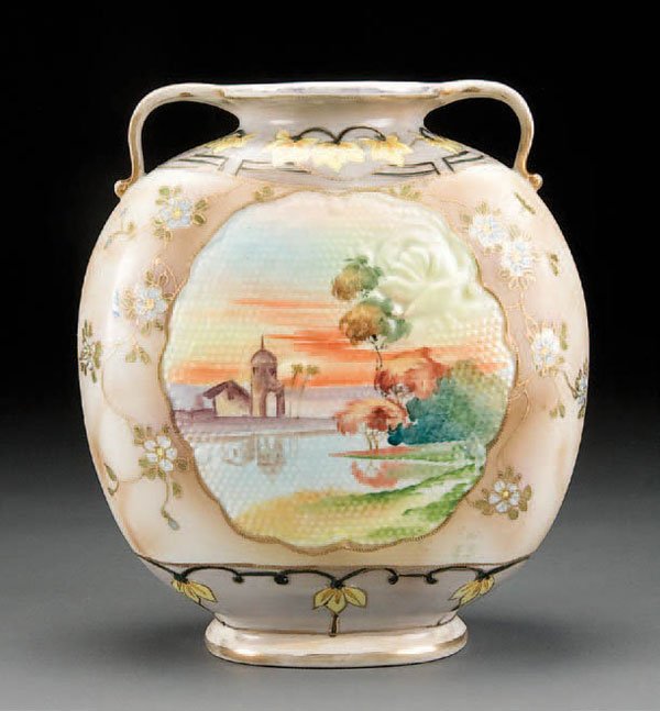 NIPPON TAPESTRY PORCELAIN VASE: A HAND PAINTED NIPPON EMBOSSED TAPESTRY HIDDEN IMAGE SCENIC PORCELAIN VASE early 20th century, with coastal scene within an embossed rose decorated medallion. Blue cherry blossom mark. Height 9.5 inch