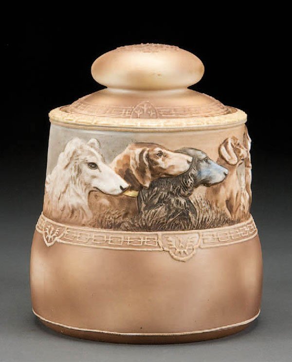 NIPPON MOLDED IN RELIEF FIVE DOGS HUMIDOR: A FINE HAND PAINTED NIPPON MOLDED IN RELIEF 'FIVE DOGS' HUMIDOR early 20th century, moriage border decoration, green M in wreath mark. Height 6 inches. Estimate $600-$900 Reference: The actual piece b