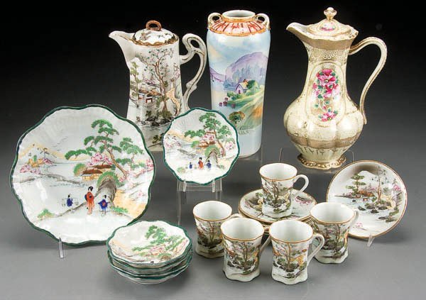 NIPPON & JAPANESE PORCELAIN: A 19-PIECE HAND PAINTED NIPPON & JAPANESE PORCELAIN GROUP early 20th century, consisting of a berry set, chocolate set, pitcher and vase. Estimate $150-$250