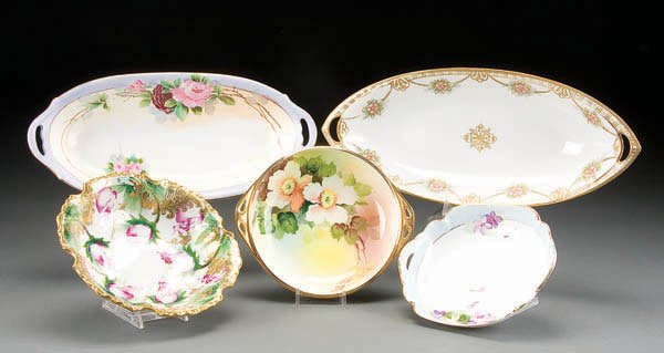 5-PIECE HAND PAINTED NIPPON TABLEWARE GROUP early: 5-PIECE HAND PAINTED NIPPON TABLEWARE GROUP early 20th century, consisting of celeries and handled bowls, assorted marks including green M in wreath. Height 6 to 13 inches. Estimate $50-$100