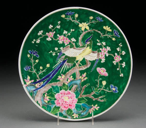 NIPPON ORIENTAL PHEASANT CHARGER: A HAND PAINTED NIPPON ORIENTAL PHEASANT DECORATED CHARGER early 20th century, with heavy enamel decoration. Marked Nippon in red. Diameter 12.25 inches. Estimate $50-$100
