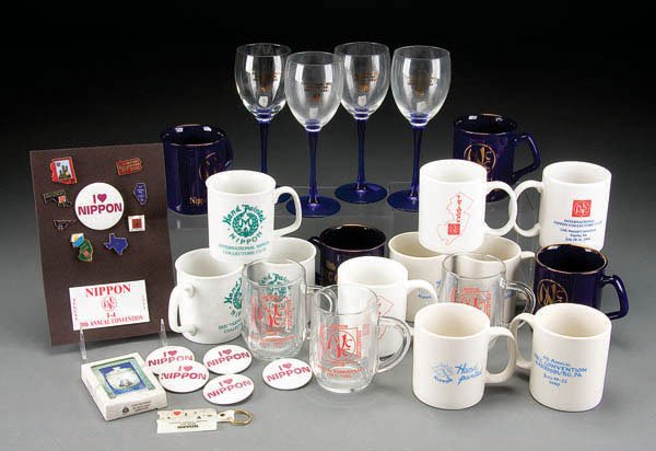 INCC NIPPON CONVENTION SOUVENIR GROUP last quarte: INCC NIPPON CONVENTION SOUVENIR GROUP last quarter 20th century, over 50 pieces including coffee mugs, enameled pins, buttons and refrigerator magnets. Mostly 1990-1995. Estimate $50-$100