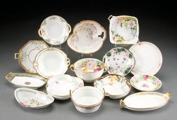 15-PIECE HAND PAINTED NIPPON TABLEWARES GROUP ear: 15-PIECE HAND PAINTED NIPPON TABLEWARES GROUP early 20th century, consisting of various handled bowls, nappies and trays with floral decoration. Assorted marks. Estimate $100-$200