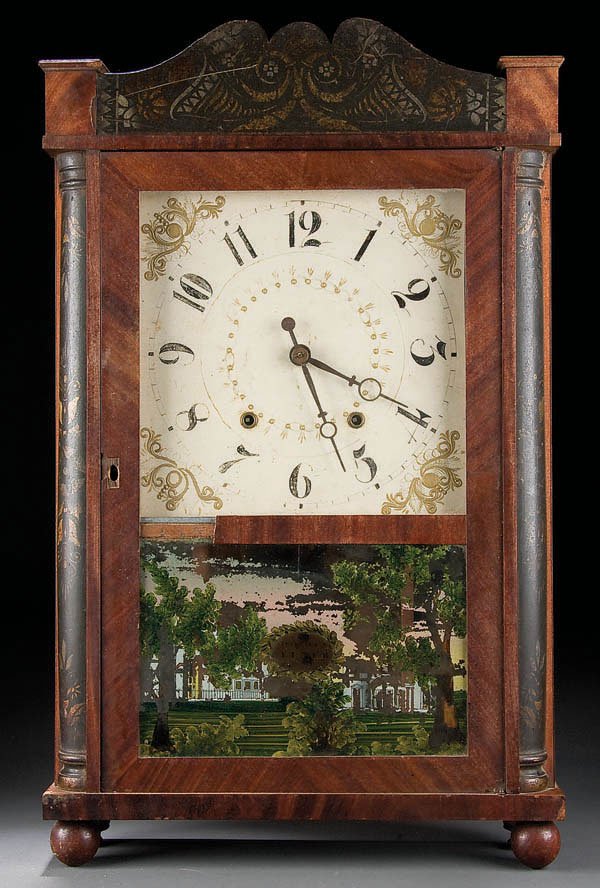 AN ELI TERRY JR. MANTEL CLOCK circa 1825. Contain: AN ELI TERRY JR. MANTEL CLOCK circa 1825. Contained in a mahogany case with black polychrome columns and reverse-painted tablets. Height 27 inches. Estimate $200-$300