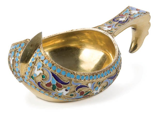 A RUSSIAN SILVER-GILT AND CLOISONNE ENAMEL KOVSH: A RUSSIAN SILVER-GILT AND CLOISONNE ENAMEL KOVSH Ivan Saltykov. The body overall enameled with scrolling foliage on a stippled gilt ground, the hook handle similarly enameled, the border with beaded e
