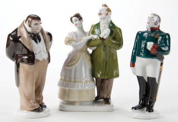 A GROUP OF THREE RUSSIAN SOVIET PERIOD PORCELAIN: A GROUP OF THREE RUSSIAN SOVIET PERIOD PORCELAIN FIGURES from Gogol's "The Government Inspector", Lomonosov Porcelain Manufactory. Greatest height 6.5 inches (16.5 cm). Estimate $500-$800 Euro 300-500