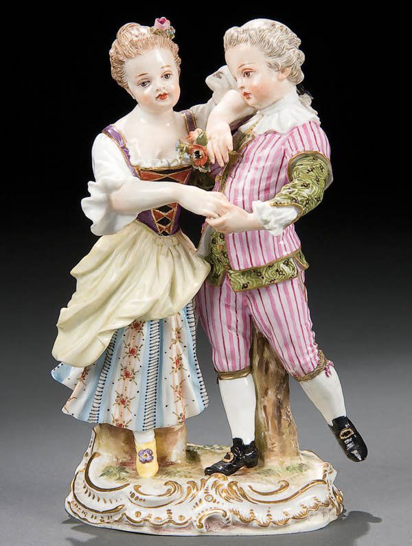 A VERY FINE MEISSEN PORCELAIN FIGURE 19th century: A VERY FINE MEISSEN PORCELAIN FIGURE 19th century. Depicting a romantic dancing couple finely painted in exquisite detail. Blue crossed pommel swords mark and incised pattern O 113. Height 5.75 inches