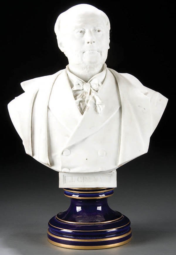 ALBERT CARRIER BELLEUSE (FRENCH 1824-1887) FOR SE: ALBERT CARRIER BELLEUSE (FRENCH 1824-1887) FOR SEVRES: A PARIAN BUST circa 1880. The bust of "J. Crevy" in biscuit ware raised on a cobalt glazed socle pedestal signed on verso "Carrier Belleuse" and 