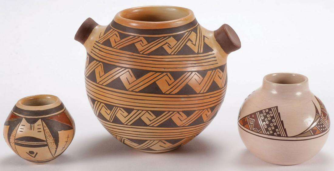 NAMPEYO HOPI POLYCHROME JARS: NAMPEYO HOPI POLYCHROME JARS. Comprising two by Pricilla Namingha Nampeyo (1924-2008) pictured left, and another example by Nathan Begaye (1969-2010) pictured at right. Each signed on underside of bas