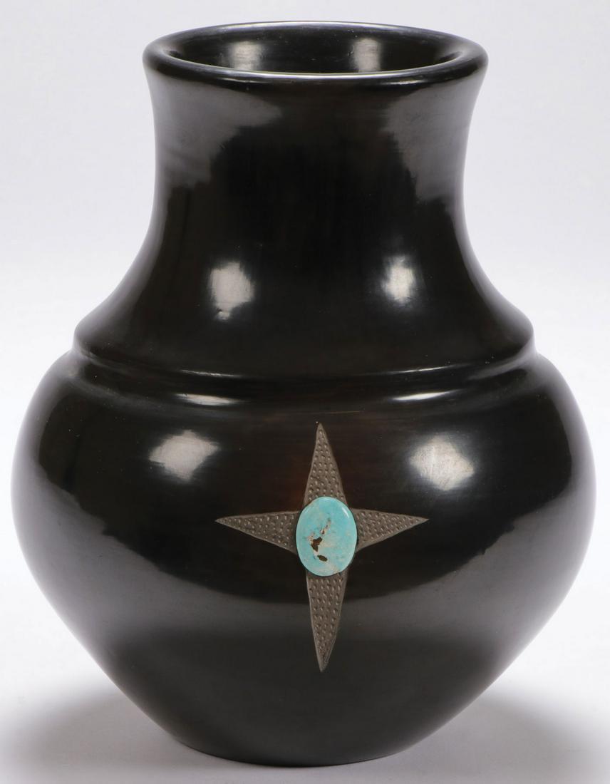 SANTA CLARA BLACKWARE JAR: SANTA CLARA BLACKWARE JAR. Of traditional form with ringed shoulder, the side mounted with chip carved star set with oval polished turquoise cabochon, attributed to noted Santa Clara artist Tina Garci