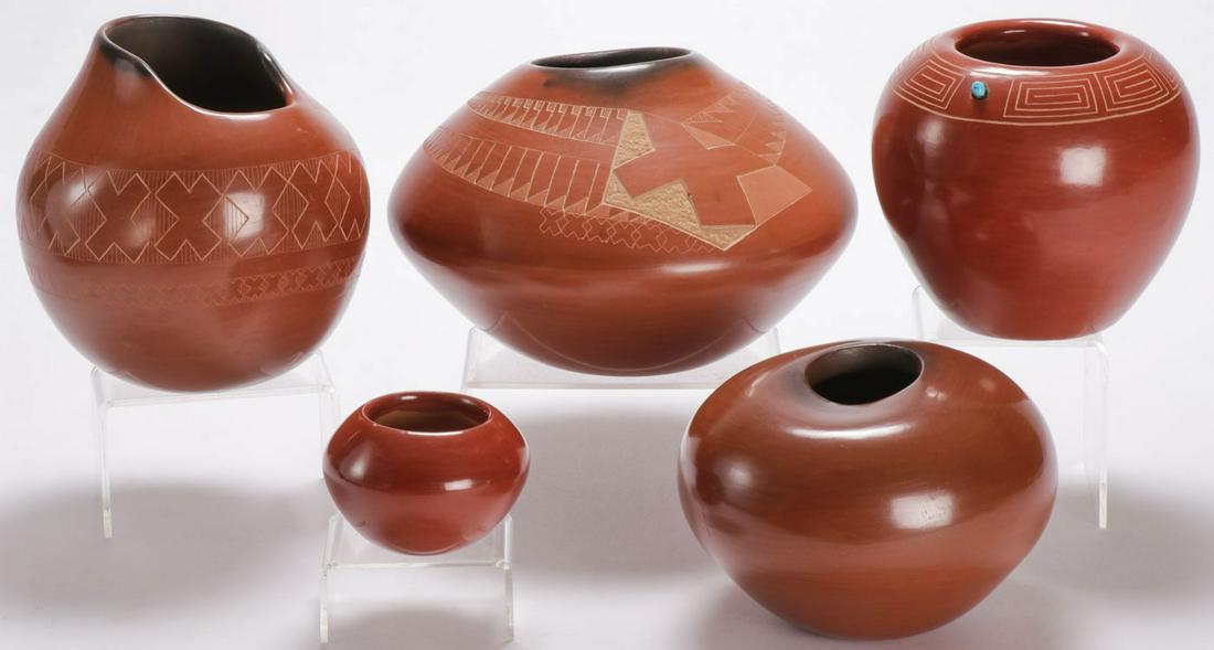 FIVE SANTA CLARA REDWARE JARS: FIVE SANTA CLARA REDWARE JARS. From top to bottom left to right, a baluster form with recessed mouth, the sides incised with repeating patterns, signed on underside Polly Rose, probably for Polly Rose