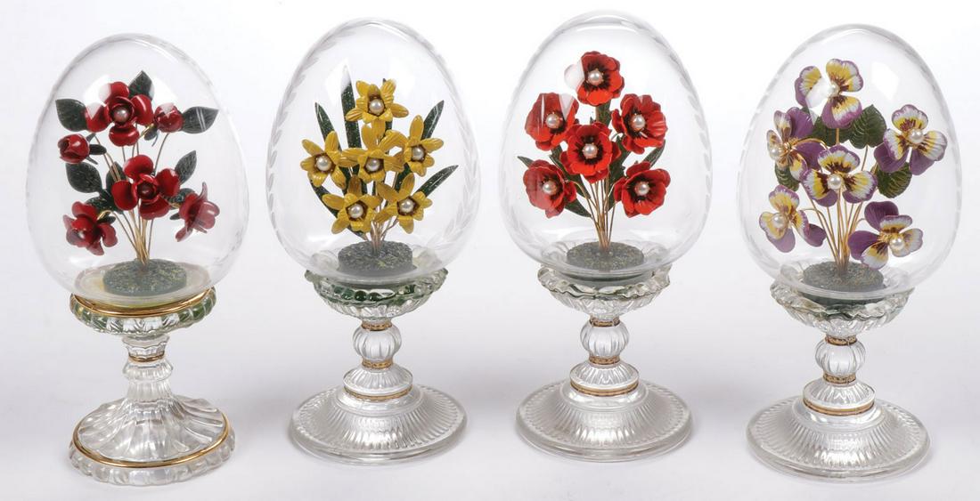 FOUR HOUSE OF FABERGÉ EGGS: FOUR HOUSE OF FABERGÉ EGGS. Comprising four house of Fabergé Franklin Mint etched crystal flower eggs. Height 6 inches (15 cm). SHIPPING NOTICE: Jackson's is your sole and only source for one stop p