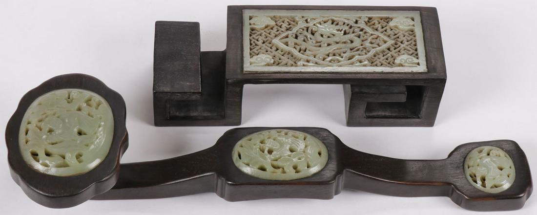 CHINESE JADE INSET SCEPTER & STAND: CHINESE JADE INSET SCEPTER & STAND. Comprising a carved hardwood Ruyi scepter with three carved oval pierced carved jade and hardstone inlaid plaques, overall length 15.5 inches (39.5 cm). Together wi
