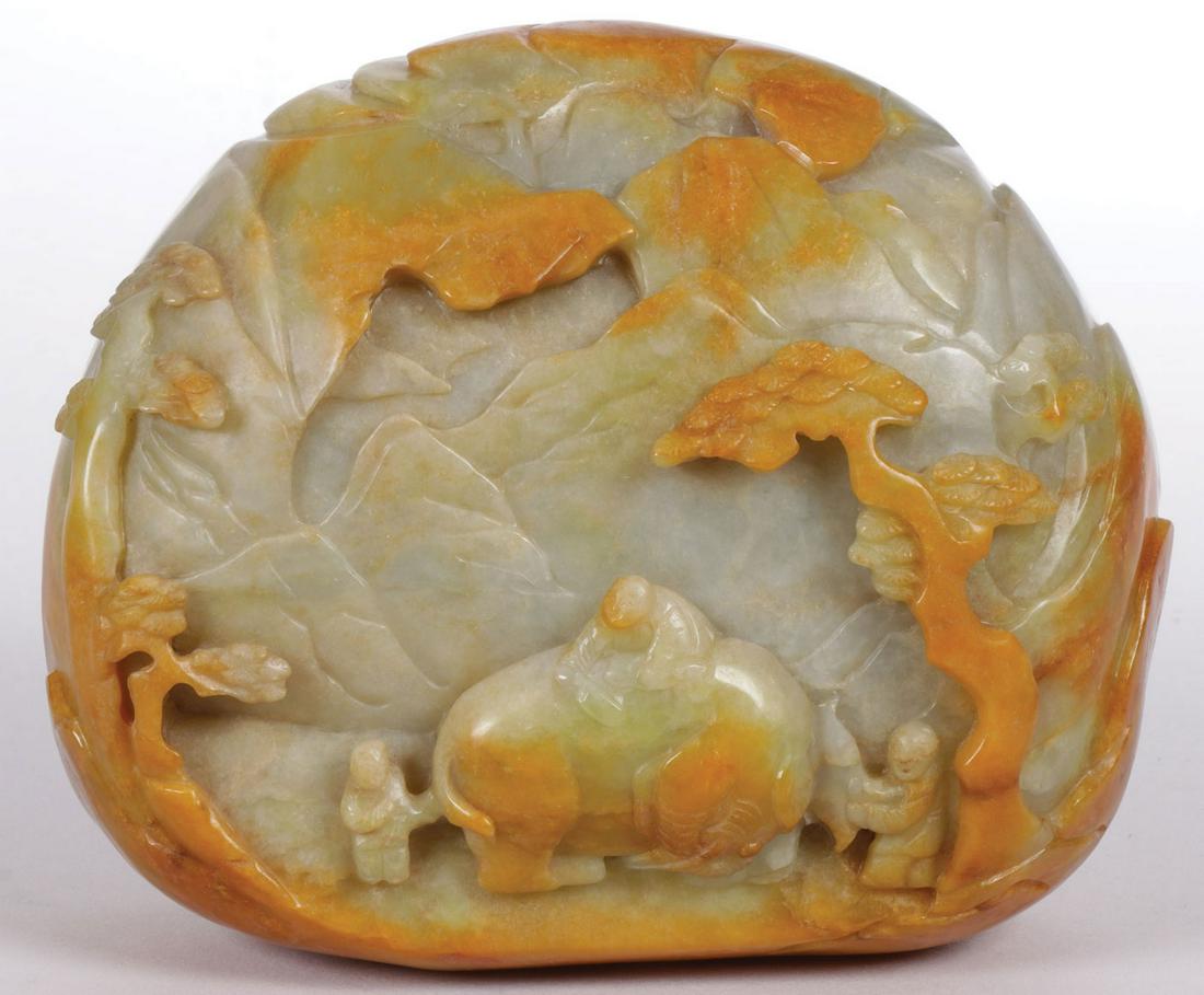 CHINESE CARVED JADE SCHOLAR'S STONE: CHINESE CARVED JADE SCHOLAR'S STONE. The front with deeply carved relief figure of three men with an elephant in a mountainous landscape and the verso carved with outlines of mountains. Height 4 inche