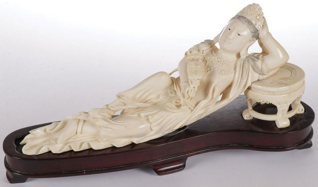 FINE CHINESE CARVED GUANYIN C. 1920: FINE CHINESE CARVED GUANYIN C. 1920. Finely carved in full round of good proportions and anatomy with flowing robes and ornately carved details including the pedestal upon which Guanyin rests her head