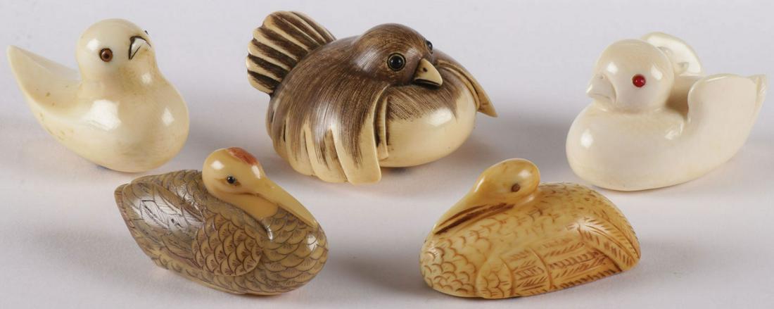 FIVE JAPANESE CARVED NETSUKES, MEIJI: FIVE JAPANESE CARVED NETSUKES, MEIJI. Each carved in the form of a bird, three with inset eyes, and each signed. Greatest measurement 2 inches (5 cm). NO INTERNATIONAL SHIPPING AND SHIPPING RESTRICTIO