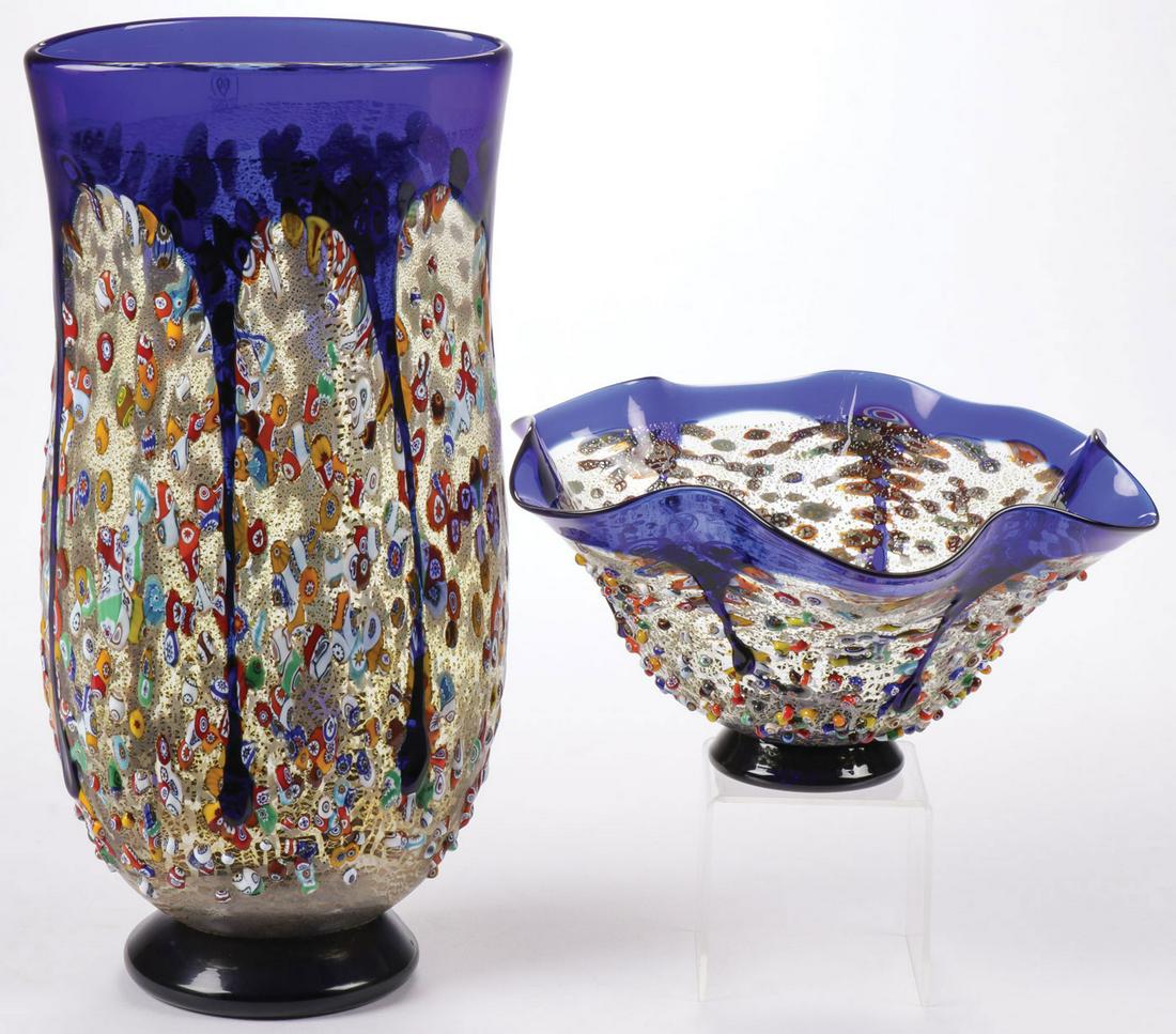 IMPERIO ROSSI MURANO VASE AND BOWL: IMPERIO ROSSI MURANO VASE AND BOWL. Comprising two works including a large footed vase with cobalt dripped rim over a millefiori body, height 13.5 inches (34.5 cm). And a similarly decorated footed bo
