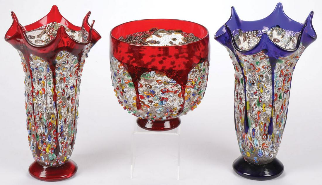 THREE IMPERIO ROSSI MURANO VASES: THREE IMPERIO ROSSI MURANO VASES. Comprising three Imperio Rossi Murano glass vases, two of similar design, one in cobalt, the other in ruby, over raised millefiori bodies on flared feet. Each measuri