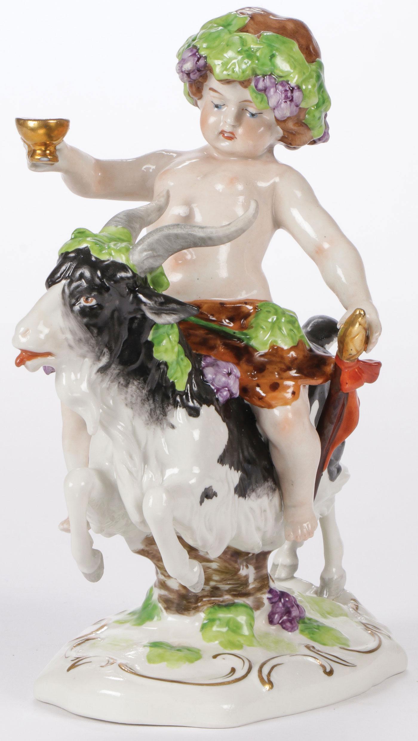 GERMAN PORCELAIN BACCHANAL FIGURINE: GERMAN PORCELAIN BACCHANAL FIGURINE. Finely modeled riding a goat. Underside with blue under glaze mark. Height 7.75 inches (19 cm). SHIPPING NOTICE: Jackson's is your sole and only source for one sto
