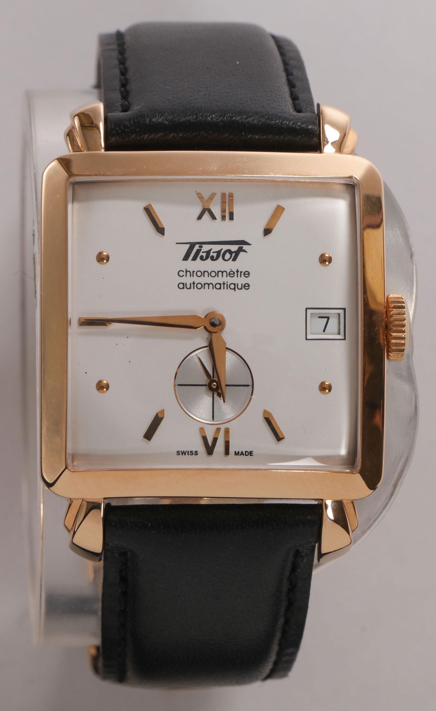 AN 18K GOLD TISSOT HERITAGE CHRONOMETER WATCH: AN 18K GOLD TISSOT HERITAGE CHRONOMETER WATCH. A Swiss made limited edition 18 karat Pink Gold Tissot Heritage watch with square case and domed mineral glass above a white opaline dial and raised ind