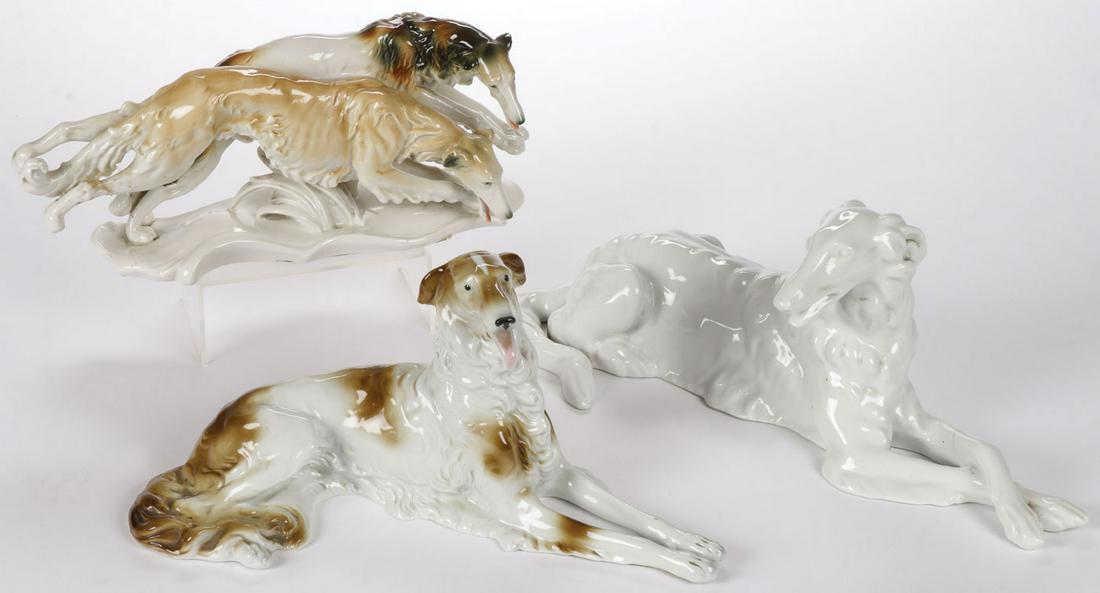 PORCELAIN DOGS FIGURINE GROUP: PORCELAIN DOGS FIGURINE GROUP. Comprising three porcelain dog figurines of Whippets. Including a double grouping by Karl Ens (repaired leg). Another with German porcelain mark and an all-white figurin
