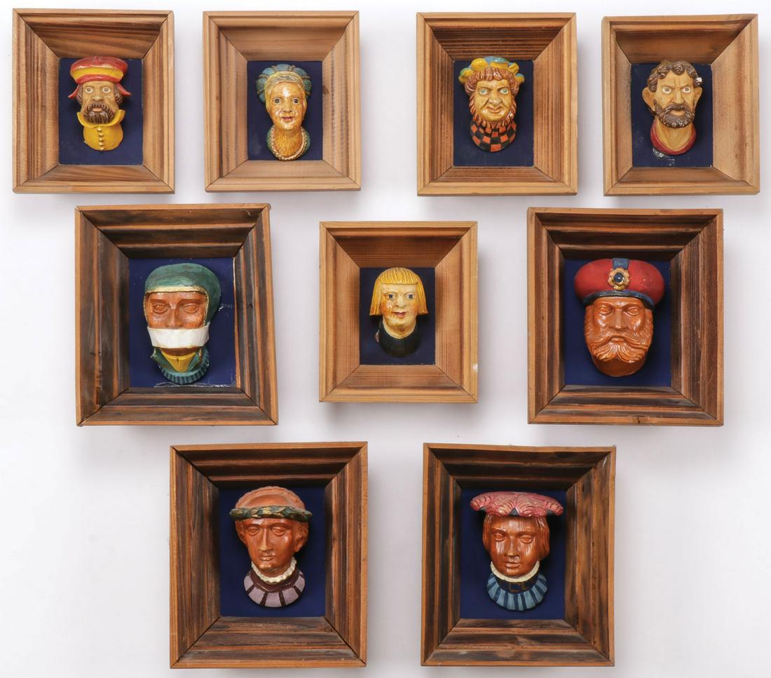 NINE WAWEL CASTLE HEADS: NINE WAWEL CASTLE HEADS. Comprising nine cast and molded polychrome Wawel castle heads in conforming shadow box frames Krakow, Poland. The verso of each with polish label. Greatest measurement 6.5 inc