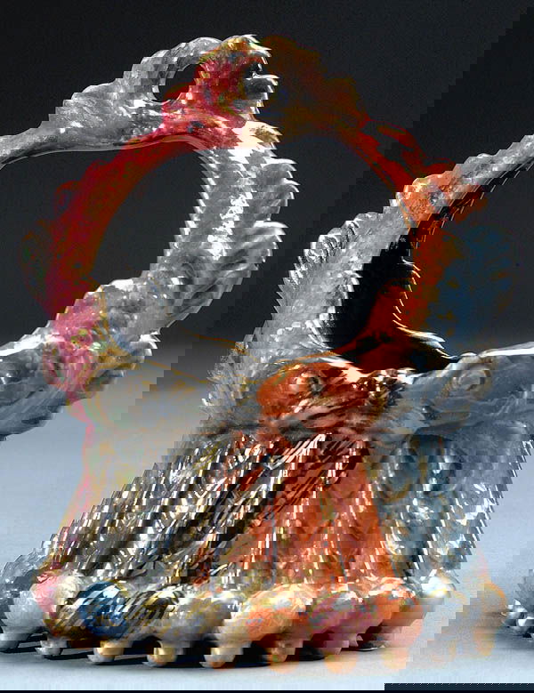 A GOOD GALLE FAIENCE POTTERY HANDLED BASKET, circ: A GOOD GALLE FAIENCE POTTERY HANDLED BASKET, circa 1890. Ribbed body with a figural fish design handle decorated in shades of red, green, orange, and blue, accented with overall gold spatter. Signed "