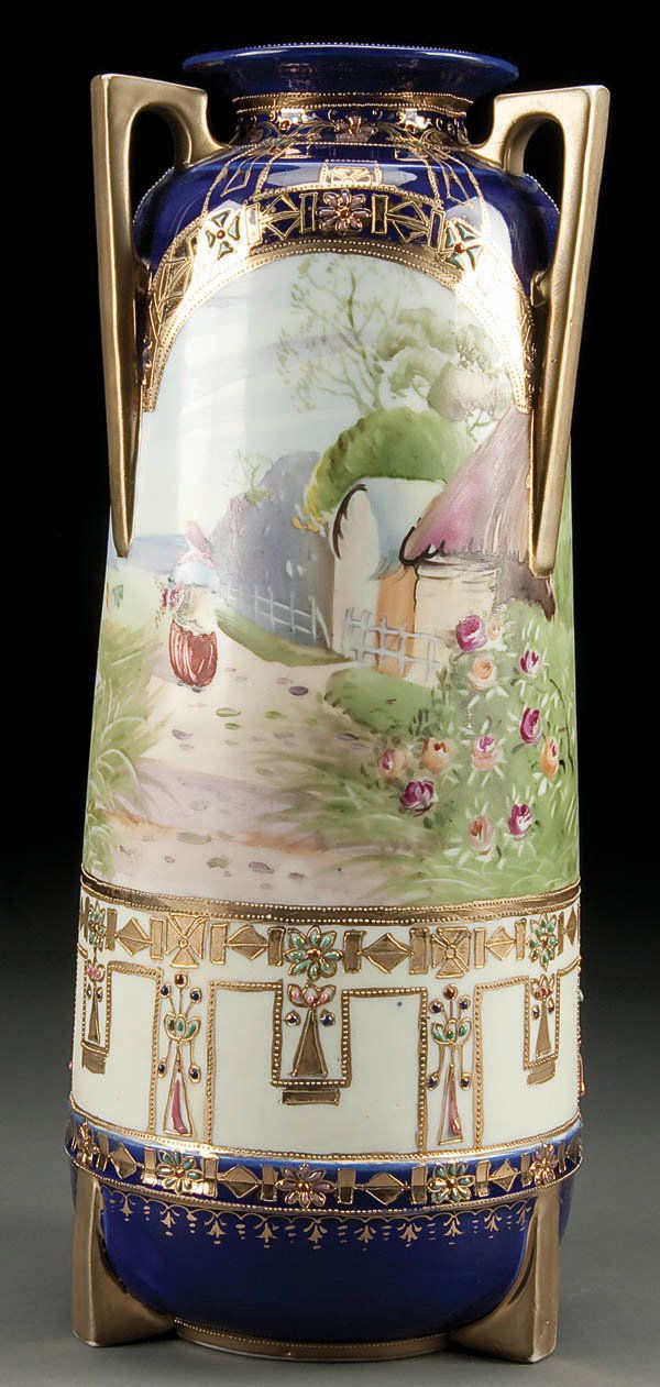 A LARGE HAND PAINTED NIPPON SCENIC JEWELED VASE: A LARGE HAND PAINTED NIPPON SCENIC JEWELED VASE early 20th century, with cottage scene below three handles. Blue maple leaf mark. Height 14 inches. Estimate $800-$1,200