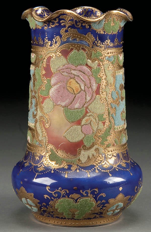 A HAND PAINTED NIPPON CORALENE VASE, early 20th c: A HAND PAINTED NIPPON CORALENE VASE, early 20th century, with gold scrolls and cobalt background. Magenta Patent Applied For mark. Height 8 inches. Estimate $400-$600
