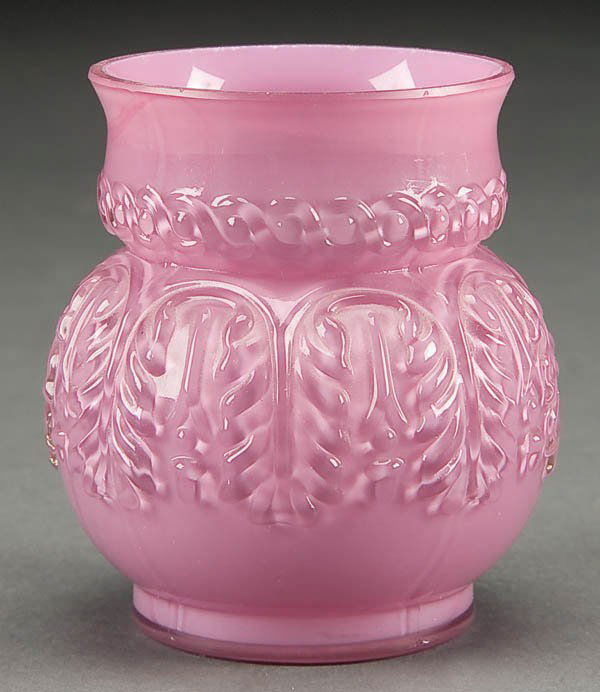 A NORTHWOOD #270 LEAF UMBRELLA TOOTHPICK HOLDER,: A NORTHWOOD #270 LEAF UMBRELLA TOOTHPICK HOLDER, late 19th century, in cased lavender glass. Height 2.5 inches. Estimate $100-$150