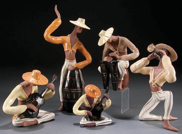 A MARC BELLAIRE JAMAICA MUSICIAN FIGURE GROUP,: A MARC BELLAIRE JAMAICA MUSICIAN FIGURE GROUP, mid 20th century, comprising 4 hand painted pottery figures playing instruments signed on bases B-36, B-37, B-38 and B-39. Height 6 inches to 14 inches.