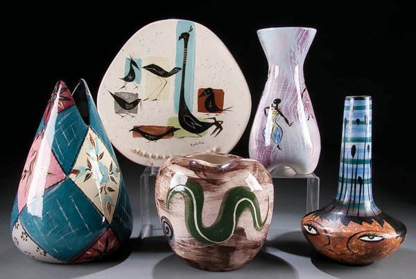 A FIVE PIECE MARC BELLAIRE STUDIO POTTERY GROUP,: A FIVE PIECE MARC BELLAIRE STUDIO POTTERY GROUP, mid 20th century, hand painted, consisting of an 11 inch face vase, 11 inch Balinese vase, patchwork vase and a bird isle tray. Estimate $100-$200