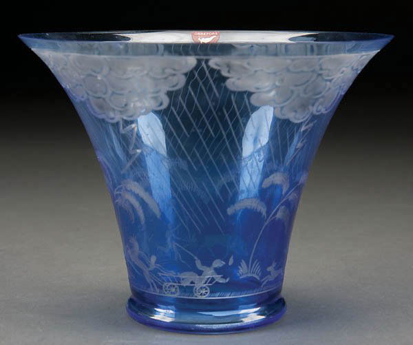 ORREFORS ART GLASS VASE ''THUNDERSTORM'' BY E. HA: ORREFORS ART GLASS VASE ''THUNDERSTORM'' BY E. HALD (Sweden 1917-1944), executed around 1920 in transparent blue glass cut to clear with a landscape and thunderstorm Art Deco design, original paper la